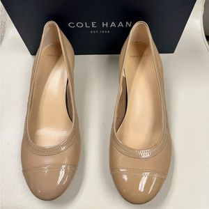 Cole Haan low wedge slip on.